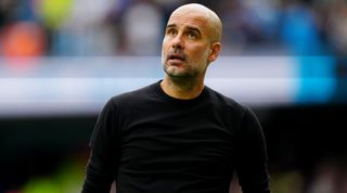Close-up shot of Manchester City manager Pep Guardiola during Manchester City 6-3 Manchester United in the Premier League on 2 October, 2022 at the Etihad Stadium in Manchester, United Kingdom
