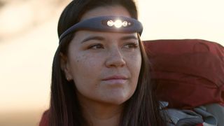 Woman wearing Knog Bilby headlamp