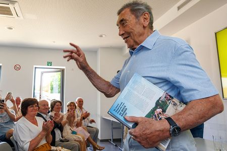 Eddy Merckx at a book launch in 2025