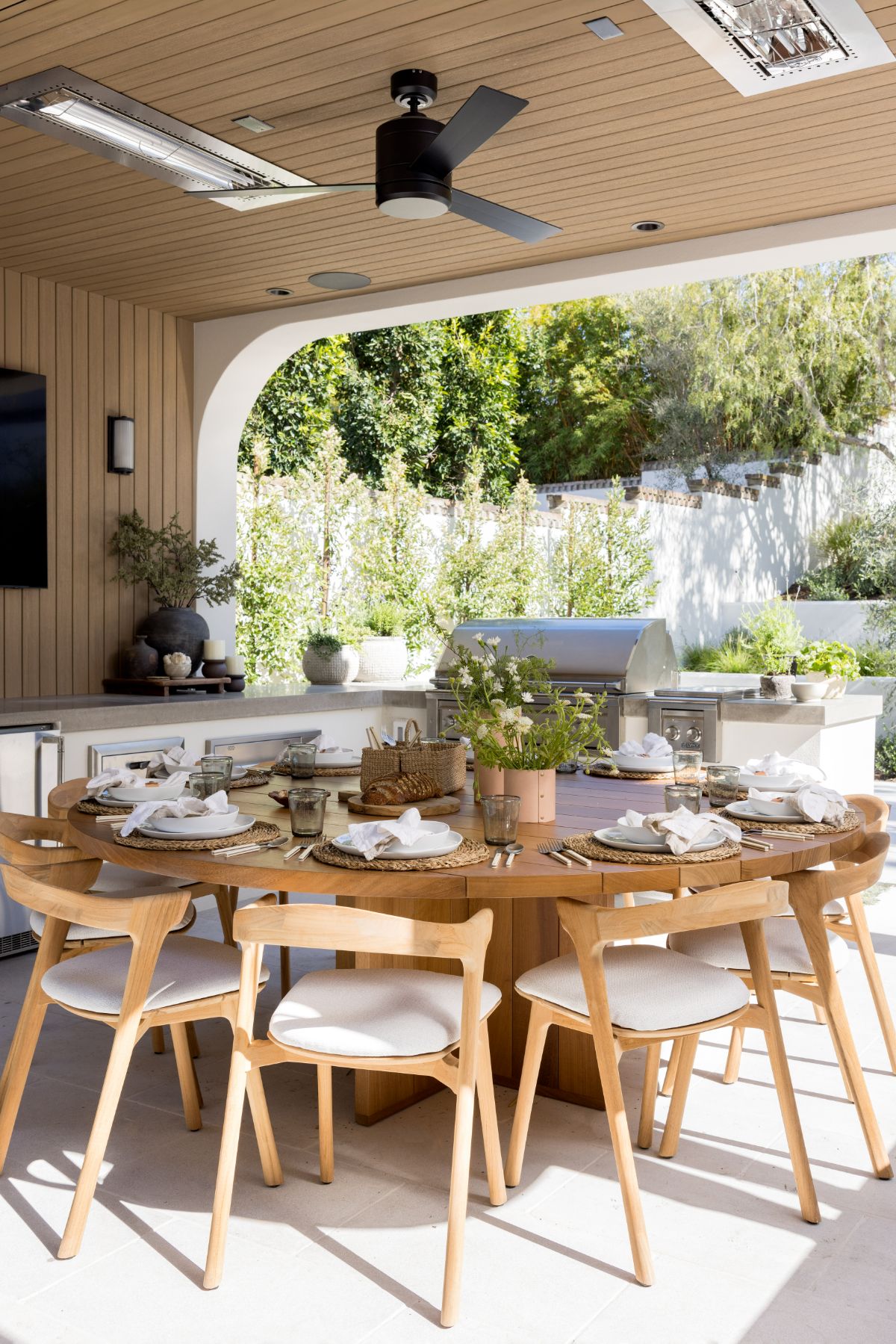 outdoor kitchen with outdoor dining seating area