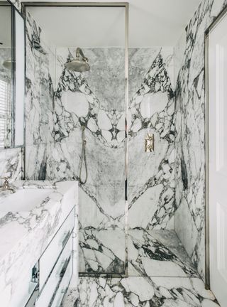 Small shower room with marble walls