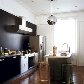 kitchen with wooden floor and fridge