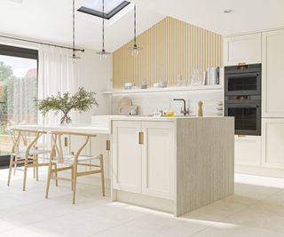 Taupe kitchen cabinets in a Scandinavian kitchen