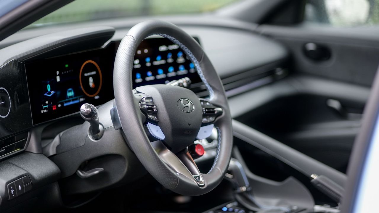 2025 Hyundai Elantra N test drive review pros and cons.