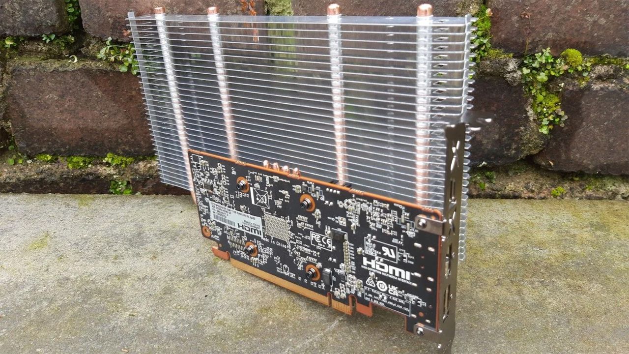 An RX 6400 graphics card with passive cooling mod installed