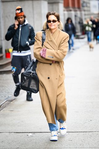 Katie Holmes out in NYC weaing a camel coat