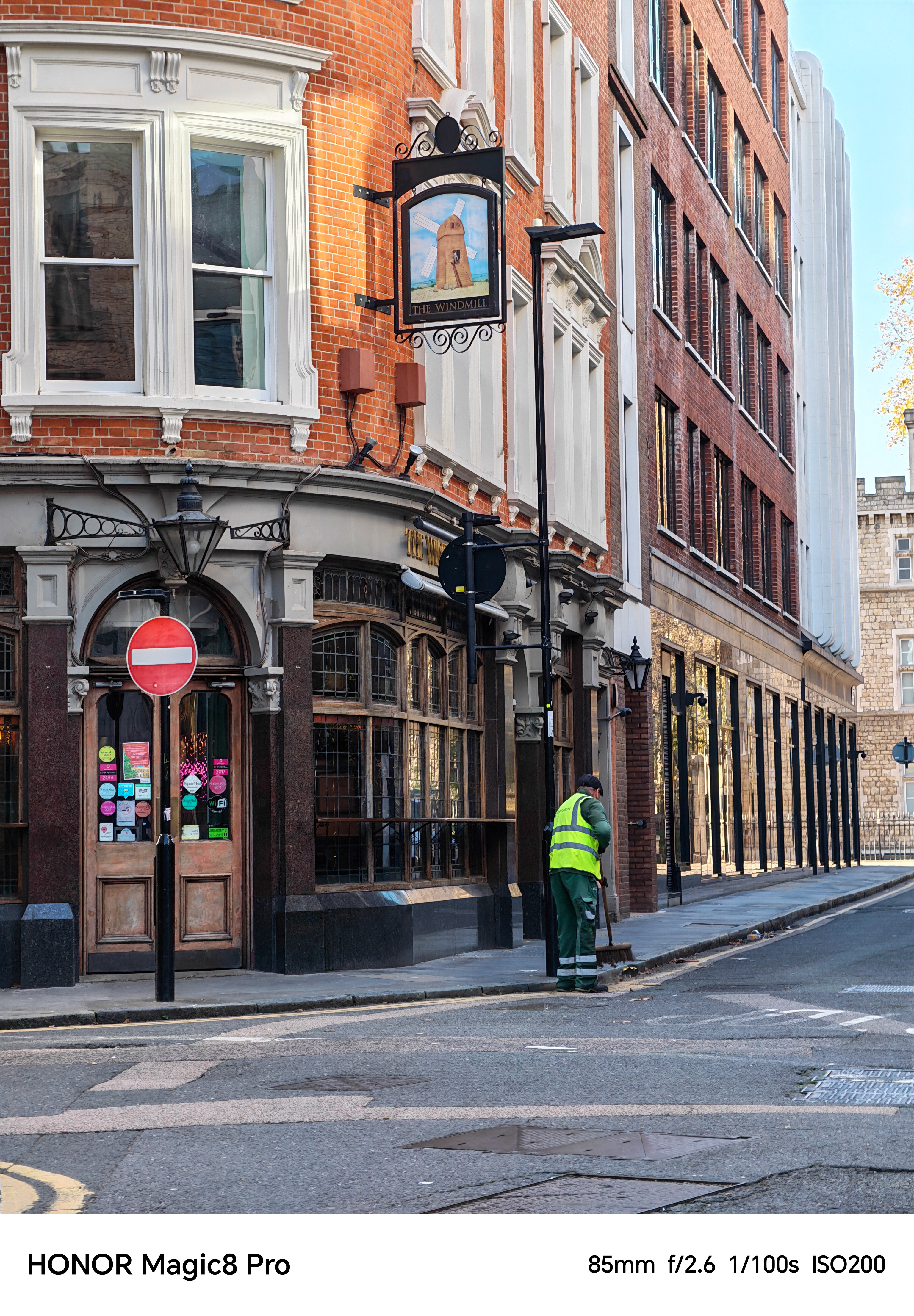 A street cleaner sweeping a street in central London shot on an Honor Magic 8 Pro