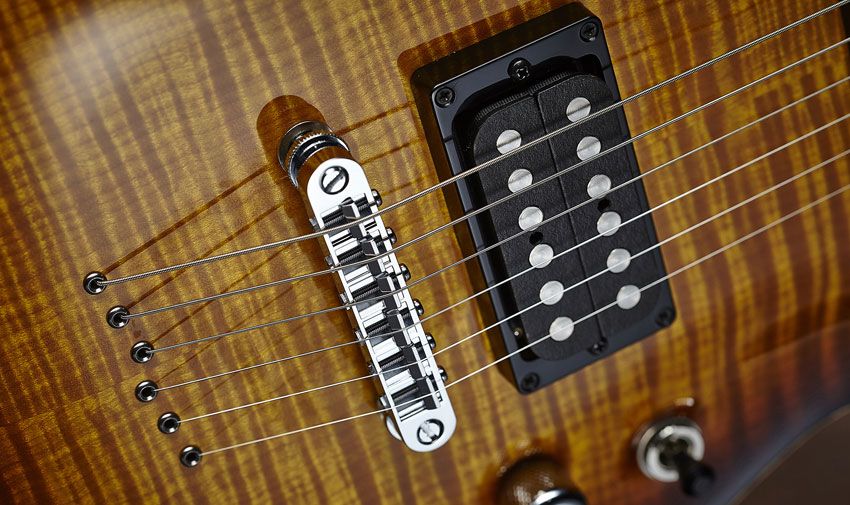 The SuperRock humbuckers are an old-school Schecter staple, and those oversized polepieces certainly catch the eye