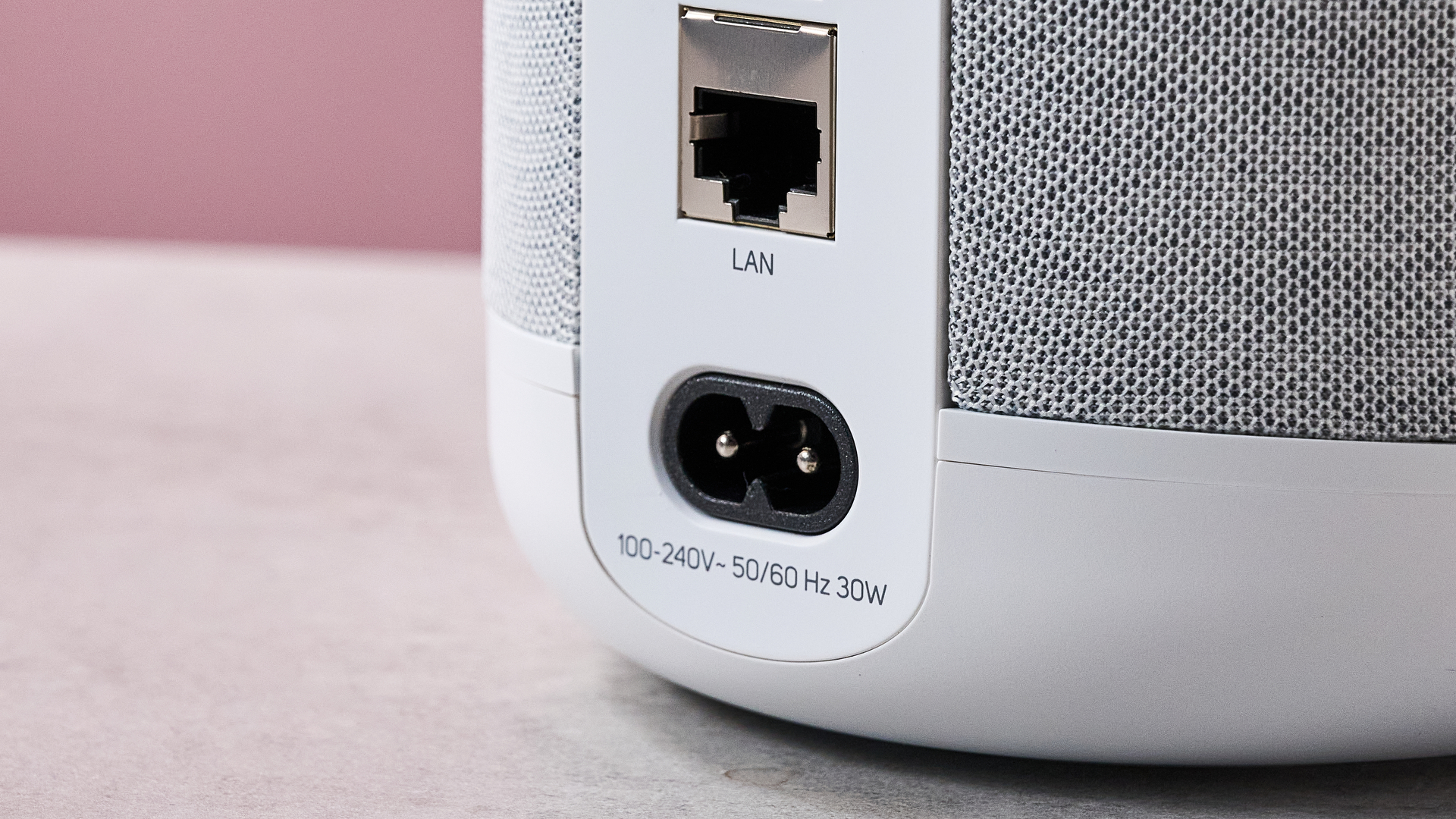 A closeup of the Bluesound Pulse Flex's ports, showing its power and Ethernet ports.