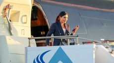 Laura Loomer arrives at Philadelphia International Airport on the Trump Organization's Boeing 757 ahead of the ABC News presidential debate on Sept. 10, 2024