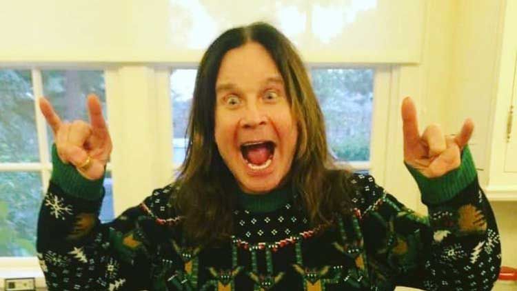 Ozzy Osbourne wearing a Christmas jumper