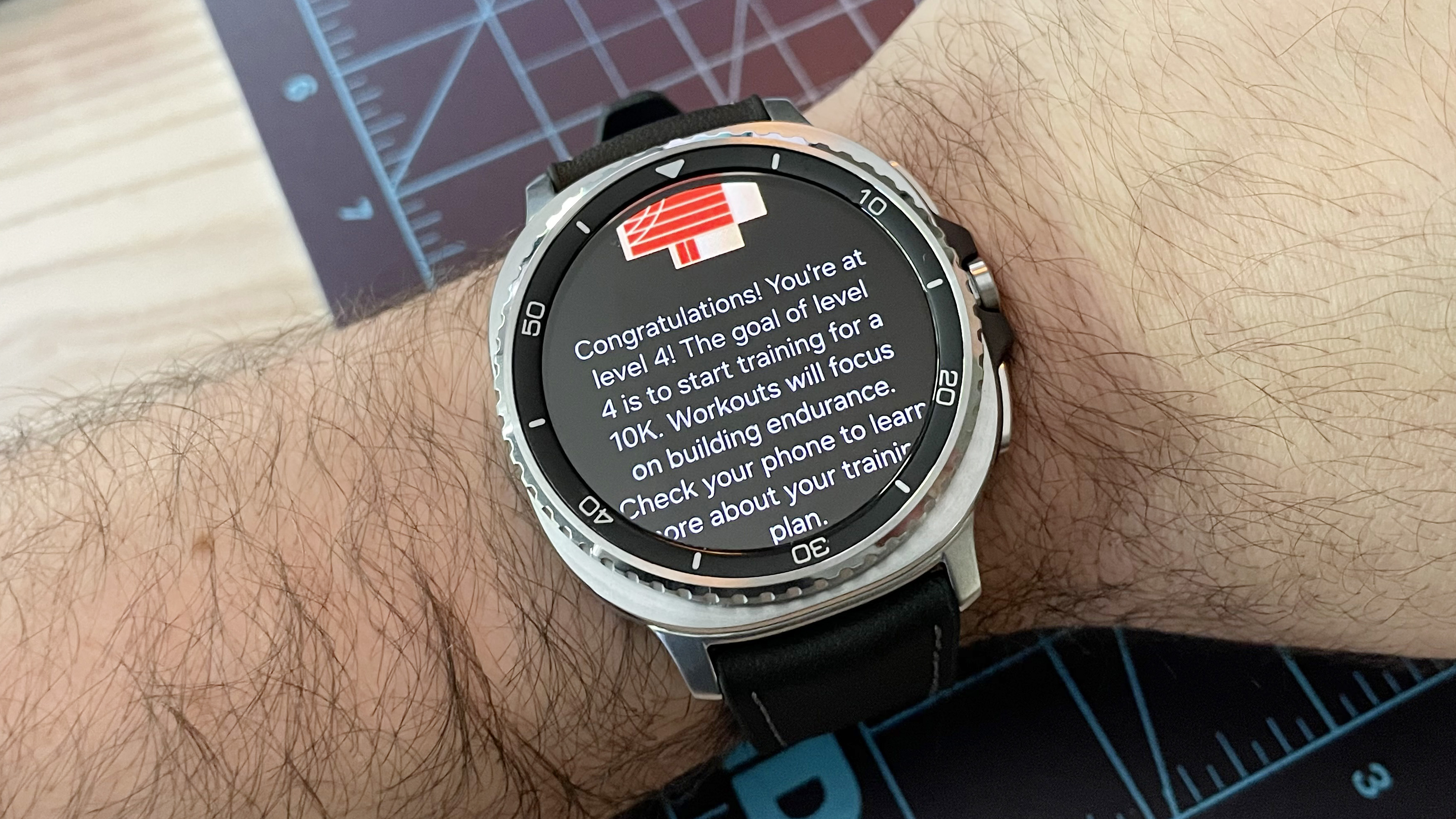 Close-up of the Samsung Galaxy Watch 8 Classic in silver on a black strap on a user's wrist