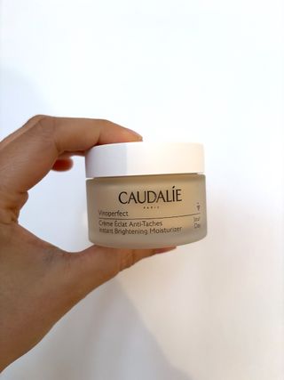 Mica Ricketts holding Caudalie Vinoperfect Instant Brightening Moisturiser