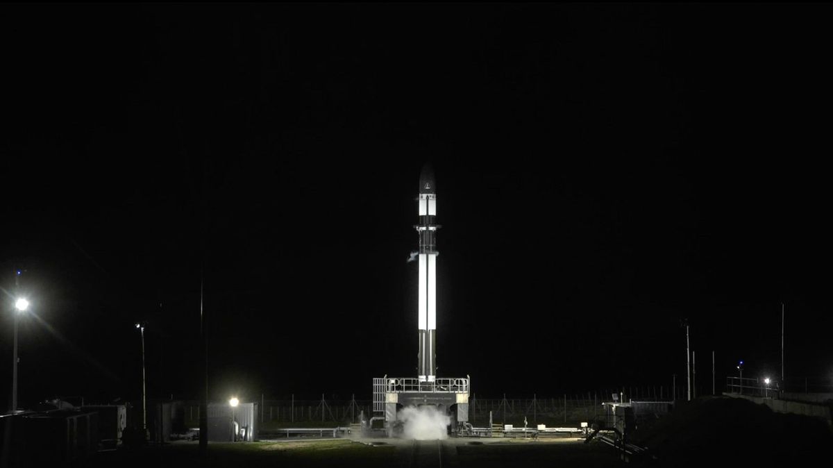 A Rocket Lab Electron rocket stands at Launch Complex 1 on New Zealand&#039;s Mahia Peninsula during fueling operations for launch on Aug. 17, 2019 local time (Aug. 16 EDT/GMT). The launch was delayed by high winds.