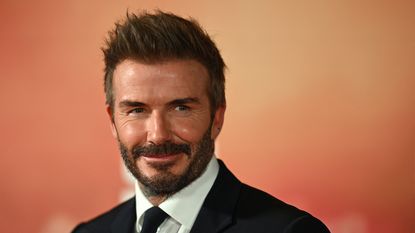 david beckham on an orange background