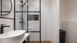 White bathroom with black accents