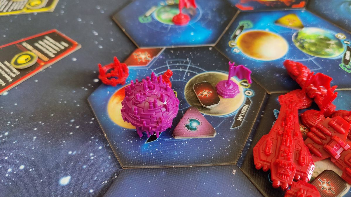 Twilight Imperium ship models on board tiles, against a starry background