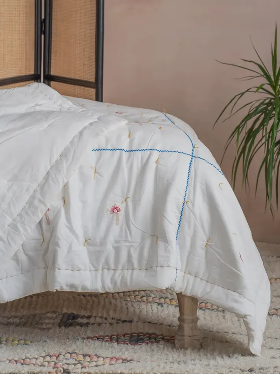 A king size quilt with bird applique from Graham &amp;amp; Green