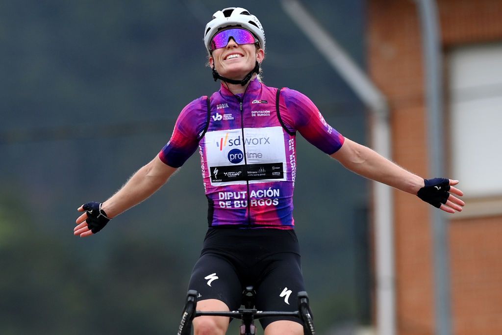 CANICOSA DE LA SIERRA SPAIN MAY 19 Demi Vollering of The Netherlands and Team SD Worx Protime Purple Leader Jersey celebrates at finish line as stage winner during the 9th Vuelta a Burgos Feminas 2024 Stage 4 a 122km stage from Pearanda de Duero to Canicosa de la Sierra 1144m UCIWWT on May 19 2024 in Canicosa de la Sierra Spain Photo by Alex BroadwayGetty Images
