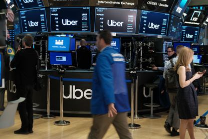The NYSE with Uber's logo