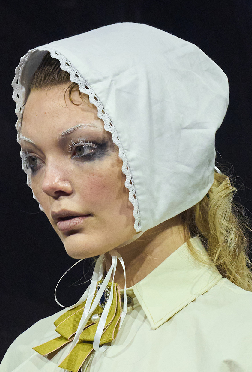 A model wearing a bonnet and smudged eye makeup at the Elena Velez NYFW SS26 show