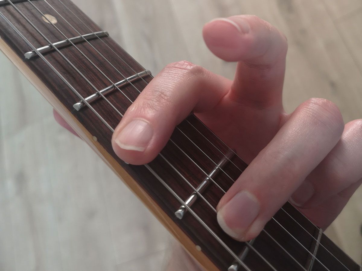 A demonstration of how to play the Bm7 E shape barre chord