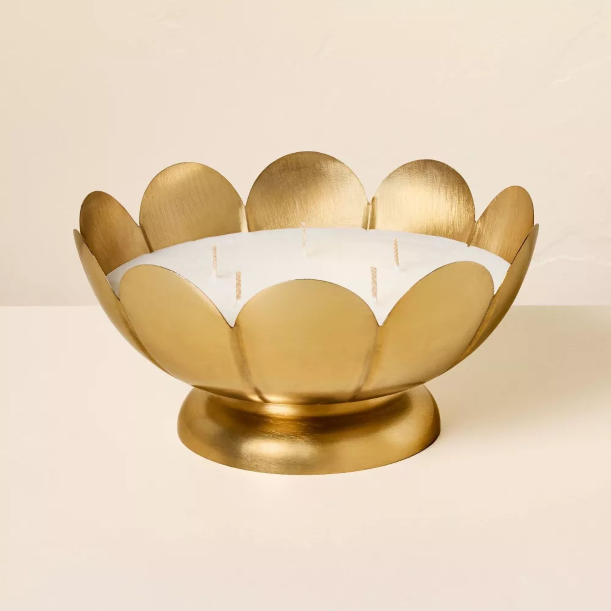 Scalloped brass candle with five wicks