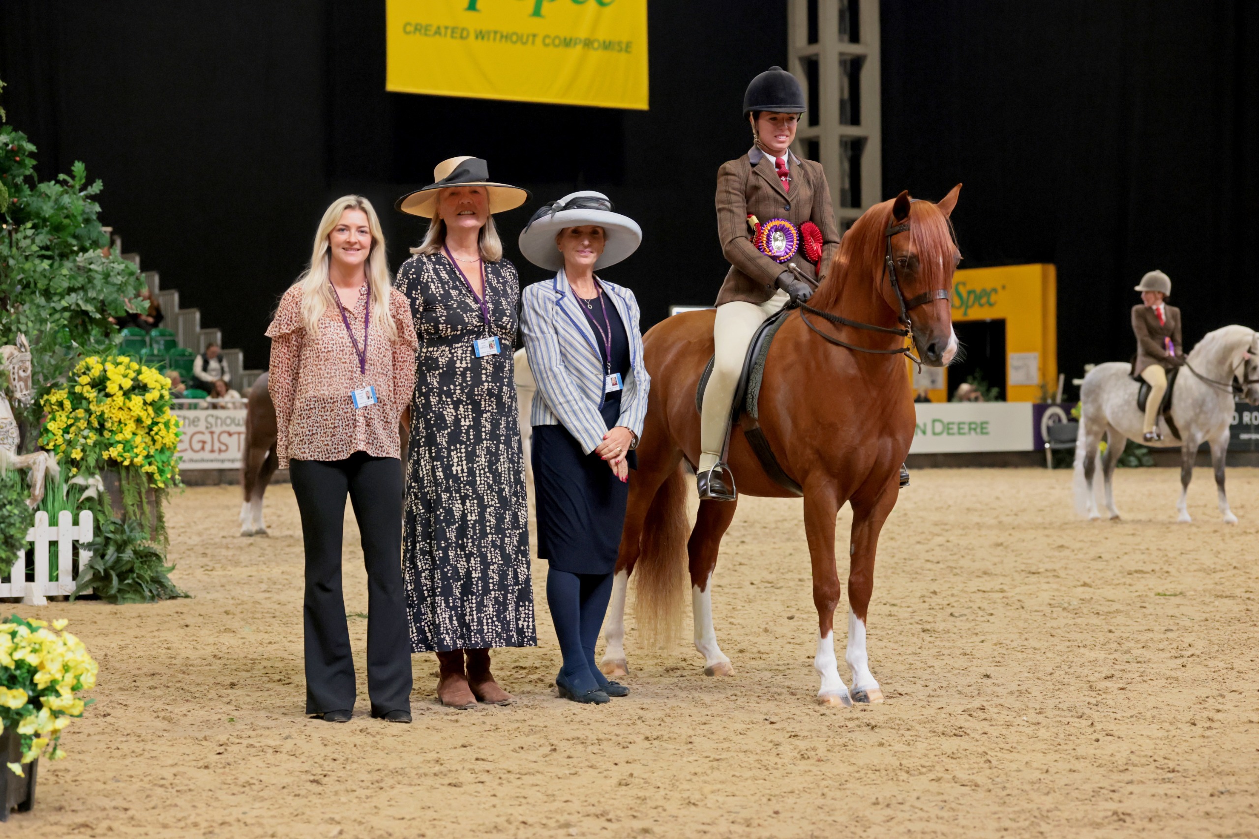 Wortley Senorita and Lucy Glover stand for a photo with judges and sponsors at HOYS 2026