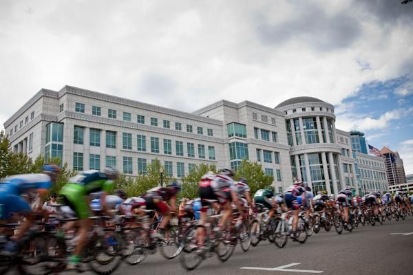 The peloton passes by the Salt Lake City courthouse.