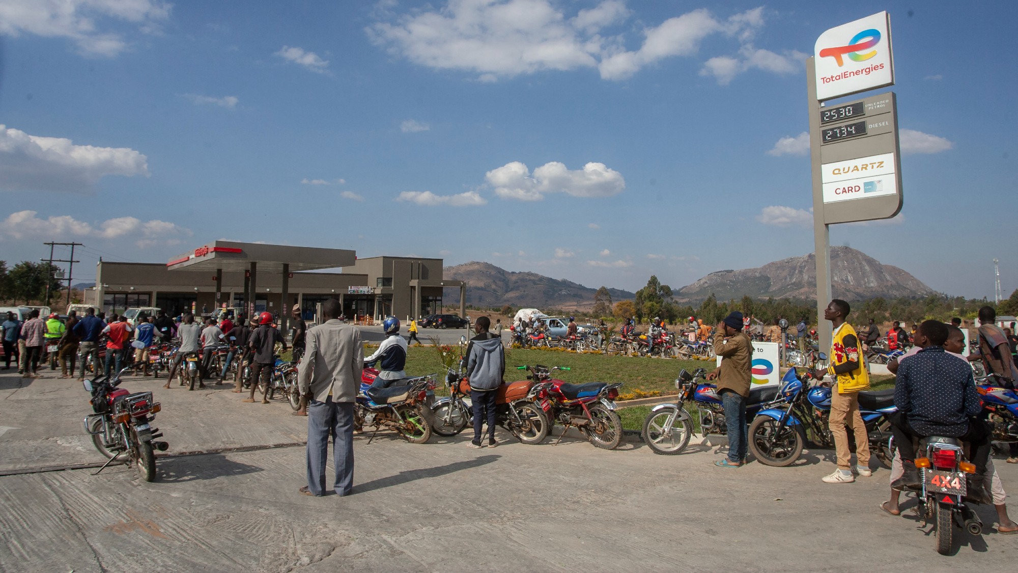 Motorists waiting at an empty forecourt in Ntcheu, central Malawi