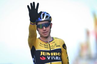 Belgian Wout Van Aert celebrates as he crosses the finish line to win the men's elite race during the 2022 Belgian Cyclocross Championships 