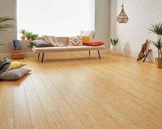 bamboo flooring in a living room using Oxwich Natural Strand Bamboo Flooring - Woodpecker flooring