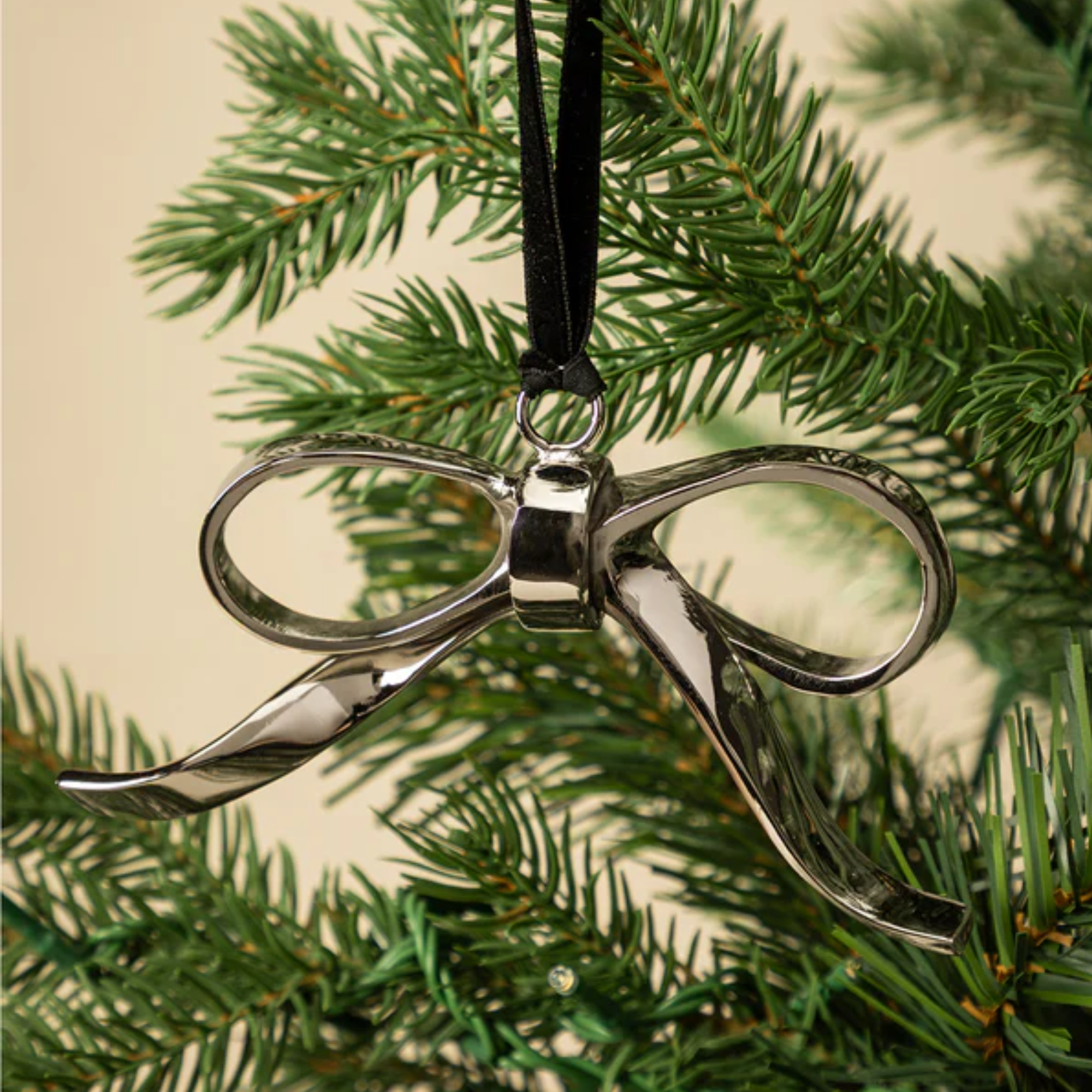a silver bow ornament
