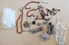 Found only after this death in 2012, Neil Armstrong had hidden in his closet the Apollo 11 "McDivitt purse" (at left) and its contents of flown-to-the-moon lunar module parts. 