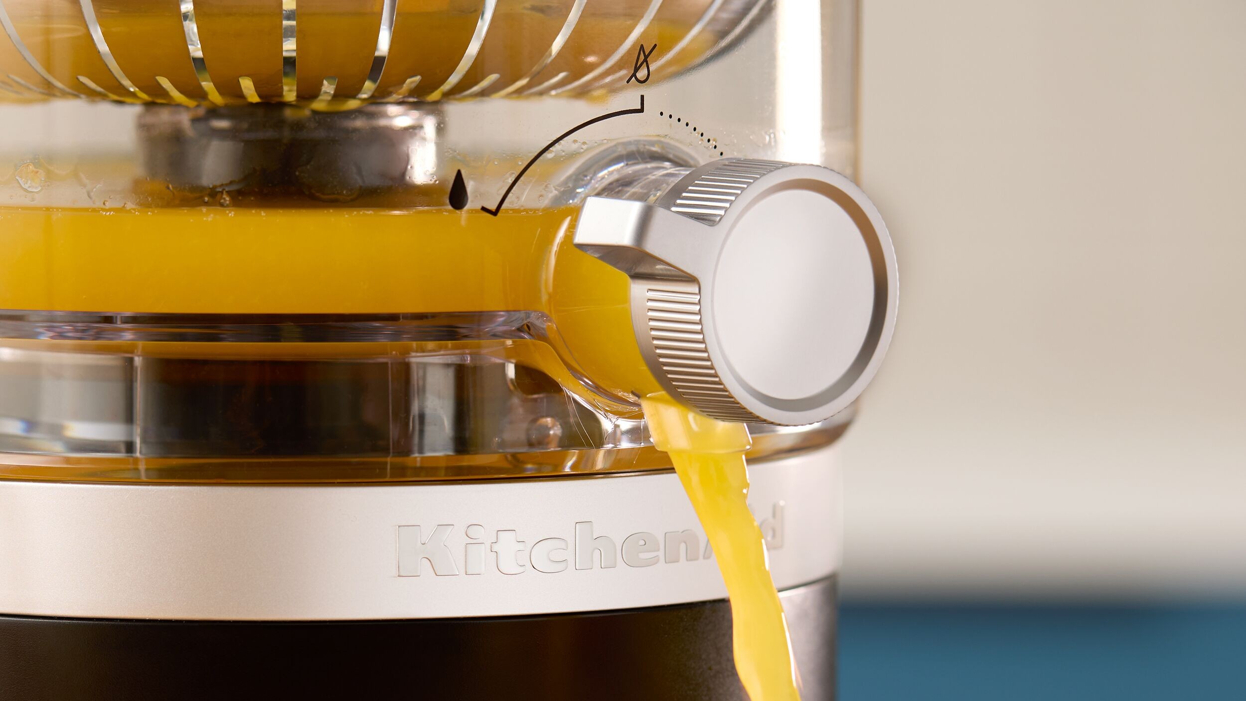 KitchenAid Go citrus juicer pour spout dispensing orange juice