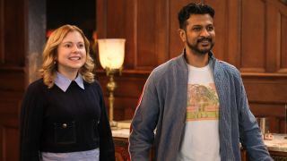 Rose McIver as Samantha and Utkarsh Ambudkar as Jay both smiling in Ghosts.