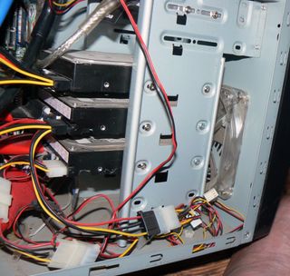 This is where the hard drives are designed to go. Note the clear 120 mm fan that blows air over them. Just as important, the front of the case allows quite a bit of air into the fan.
