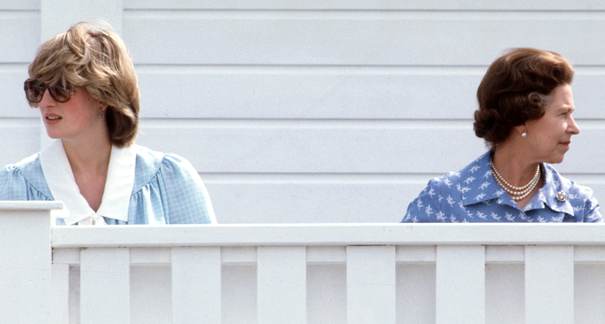 Princess Diana and Queen Elizabeth wearing blue