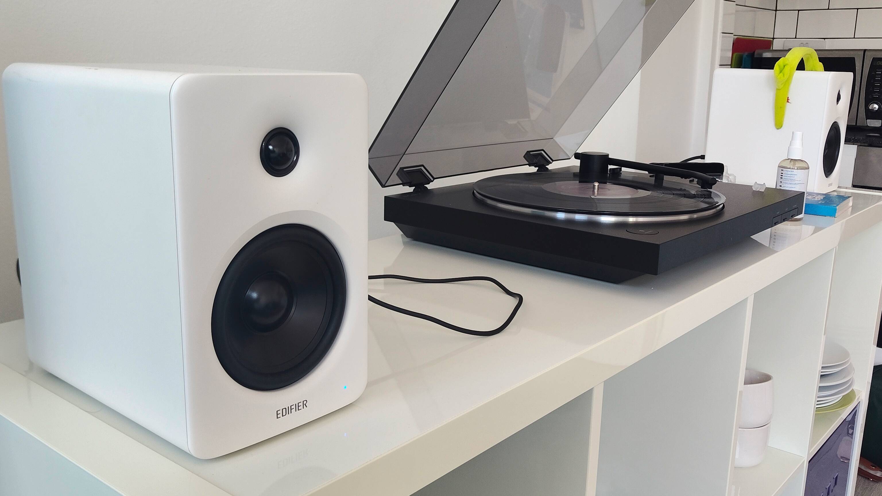The Sony PS-LX310BT and Edifier M90 on a shelf.