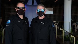 Virgin Galactic pilots Mark "Forger" Stucky (right) and Michael "Sooch" Masucci flew the SpaceShipTwo VSS Unity during its second glide flight at Spaceport America in New Mexico on June 25, 2020.