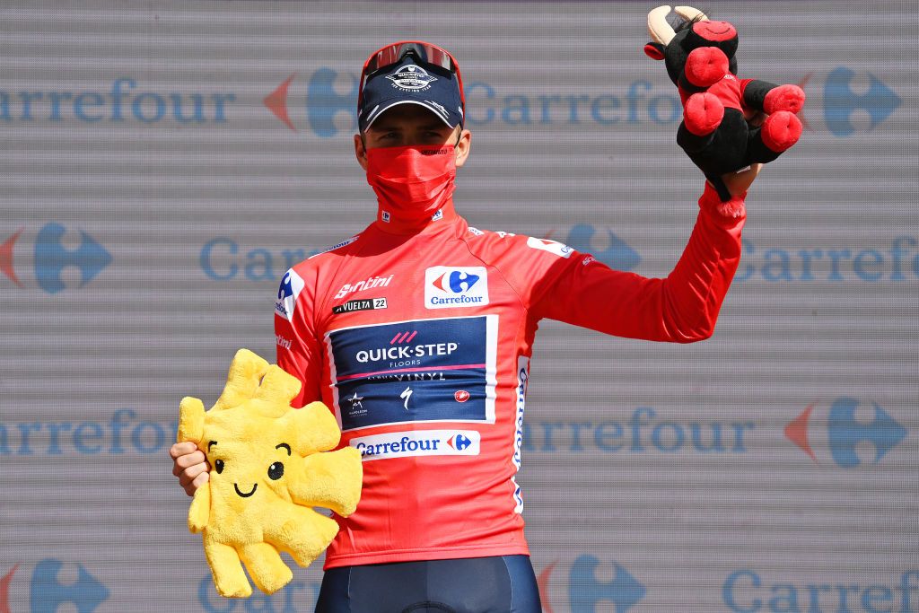 CISTIERNA SPAIN AUGUST 26 Remco Evenepoel of Belgium and Team QuickStep Alpha Vinyl Red Leader Jersey celebrates at podium during the 77th Tour of Spain 2022 Stage 7 a 190km stage from Camargo to Cistierna LaVuelta22 WorldTour on August 26 2022 in Cistierna Spain Photo by Justin SetterfieldGetty Images