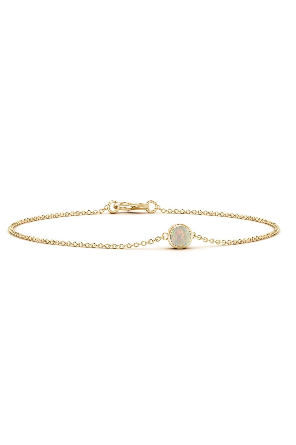 thin opal bracelet in yellow gold