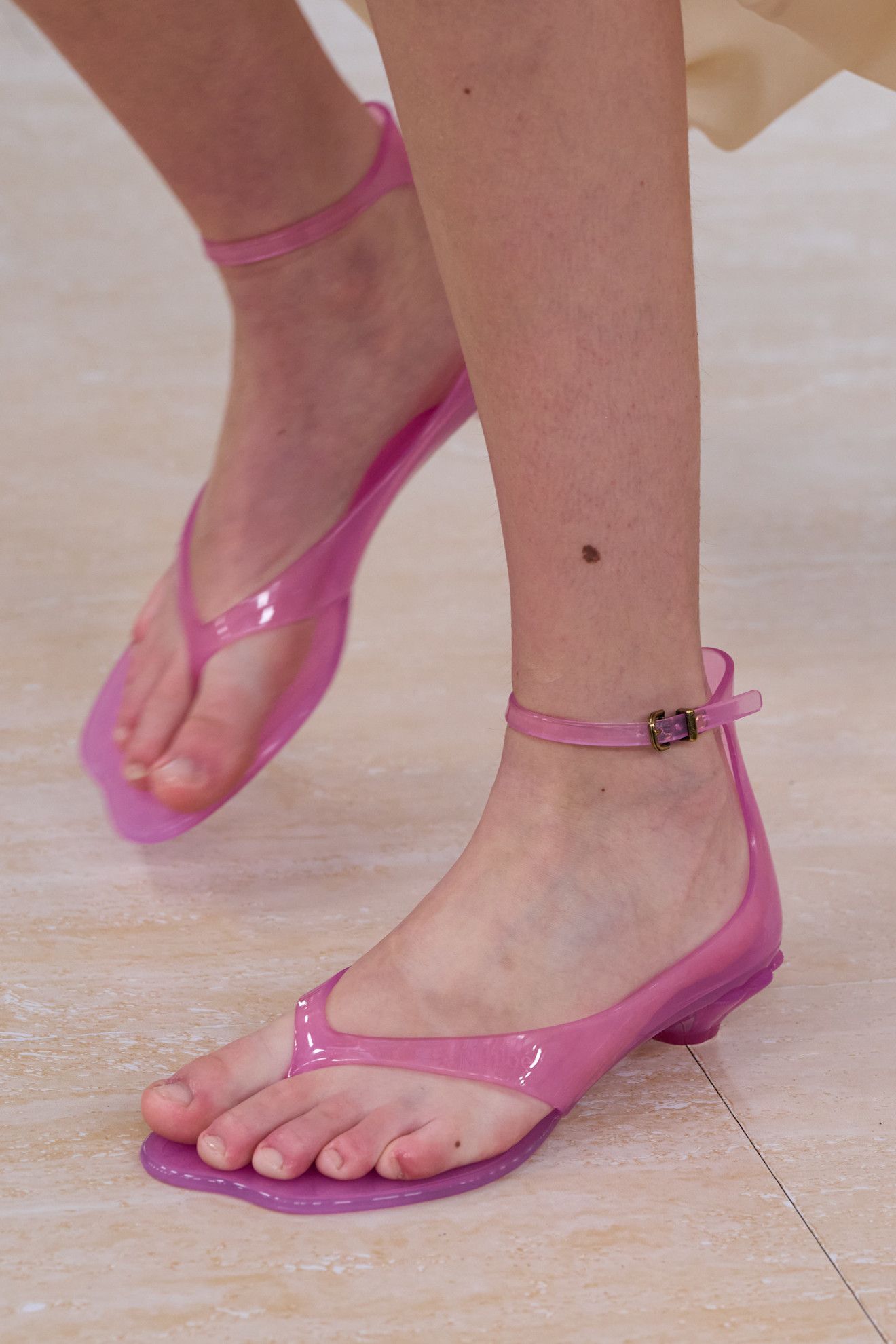 Chloe model wearing jelly sandals.