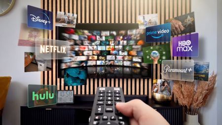 logos for Netflix, Disney+, Hulu, HBO Max, Prime Video and Paramount+ on a TV with streaming services