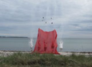 Explosives with 50 metres of red Kvadrat fabric attached