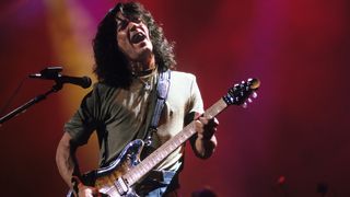 Eddie Van Halen of Van Halen performs on stage on the 17th April 1998, at Rod Laver Arena in Melbourne, Australia