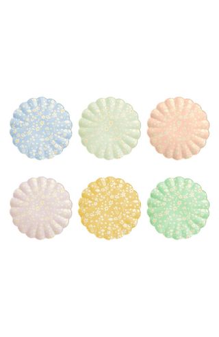 six floral plates in different pastel colors with a soft white floral design