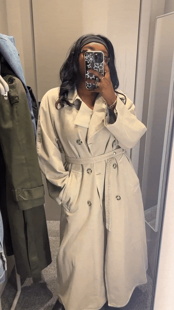 Remi wears the garment dyed trench coat by Arket