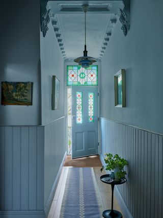 A light blue painted entryway