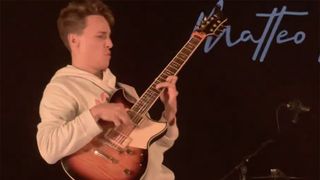 Matteo Mancuso playing guitar live